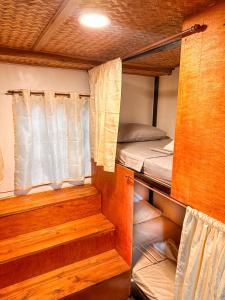 Postel nebo postele na pokoji v ubytování Hangout's Hostel El Nido