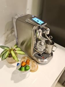a coffee maker sitting on a counter with food at Villa Mimosa 1, Splendid 4 Bedroom Master Ensuite in Phuket Town