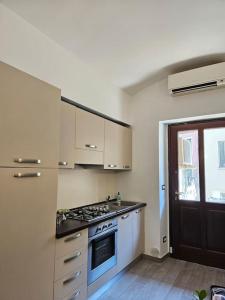 Η κουζίνα ή μικρή κουζίνα στο Loft in Centro Mole Antonelliana +15 φωτογραφίες