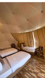 Postel nebo postele na pokoji v ubytování Lulua luxury camp