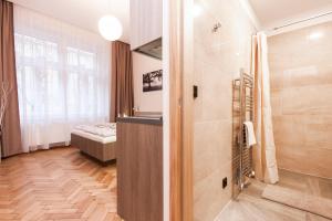 Un baño de Manesova Astra Apartment