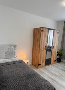Postel nebo postele na pokoji v ubytování Apartment Künzelsau II + 17 fotografií