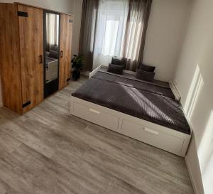 Postel nebo postele na pokoji v ubytování Apartment Künzelsau II
