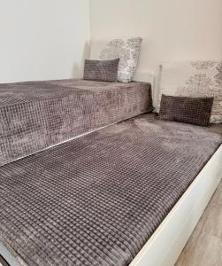 Postel nebo postele na pokoji v ubytování Apartment Künzelsau II