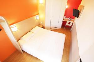 Cama o camas de una habitación en Premiere Classe Orange