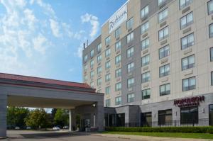 a rendering of the front of a hotel at Radisson Hotel Detroit Metro Airport in Romulus
