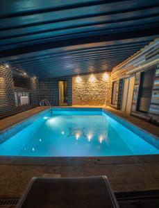 Bazén v ubytování Gîte Mise au Vert nebo v jeho okolí