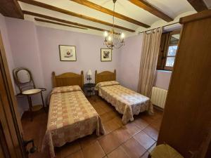 Posteľ alebo postele v izbe v ubytovaní Casa Rural Carcelen