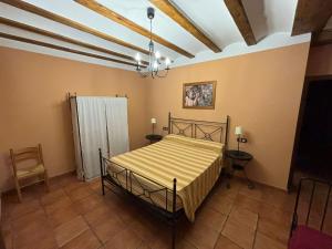 Postel nebo postele na pokoji v ubytování Casa Rural Carcelen