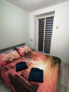 Postel nebo postele na pokoji v ubytování Casa Ramalma tra Milano-Rho Fiera, Milano, Monza, Como