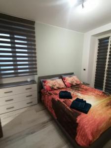 Postel nebo postele na pokoji v ubytování Casa Ramalma tra Milano-Rho Fiera, Milano, Monza, Como