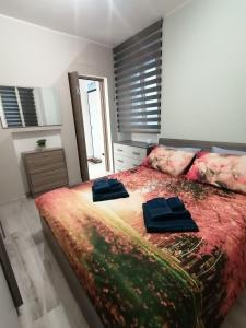 Postel nebo postele na pokoji v ubytování Casa Ramalma tra Milano-Rho Fiera, Milano, Monza, Como