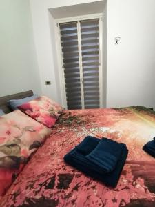 Postel nebo postele na pokoji v ubytování Casa Ramalma tra Milano-Rho Fiera, Milano, Monza, Como