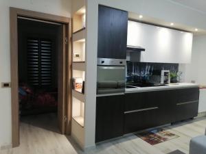 Kuchyň nebo kuchyňský kout v ubytování Casa Ramalma tra Milano-Rho Fiera, Milano, Monza, Como