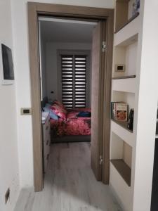Postel nebo postele na pokoji v ubytování Casa Ramalma tra Milano-Rho Fiera, Milano, Monza, Como
