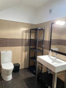 Koupelna v ubytování Ocean Guest House + 4 fotografie