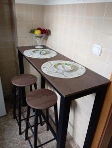 A kitchen or kitchenette at Apartman Fontana