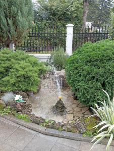 A garden outside Apartman Fontana