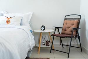 Katil atau katil-katil dalam bilik di Upscale 2BR apartment with a complete view of the sea on Al Reem Island