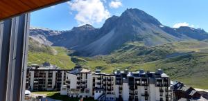 a view of a mountain from a hotel window at Duplex ,Tignes Val Claret, pied des pistes in Tignes