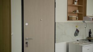 Una cocina o cocineta en Sova apartman 2