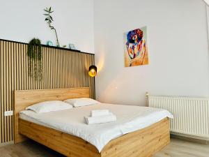 Postel nebo postele na pokoji v ubytování Cozy Hideout - Condo Hotel