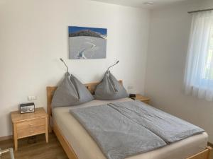 Posteľ alebo postele v izbe v ubytovaní Ferienwohnung Brandtner Leogang