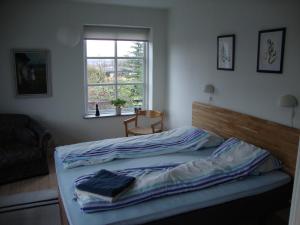 Tempat tidur dalam kamar di Klosterpensionen Annex