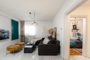 Posezení v ubytování Deluxe Apartment RoMa
