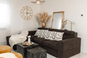 Posezení v ubytování Deluxe Apartment RoMa