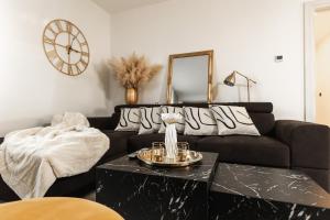 Posezení v ubytování Deluxe Apartment RoMa