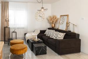 Posezení v ubytování Deluxe Apartment RoMa