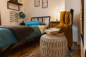 Postel nebo postele na pokoji v ubytování Deluxe Apartment RoMa