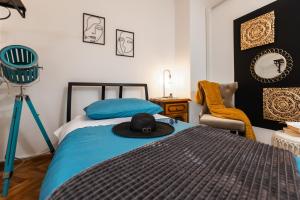 Postel nebo postele na pokoji v ubytování Deluxe Apartment RoMa