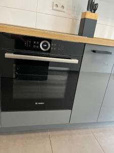 Kuchyň nebo kuchyňský kout v ubytování 2 Zimmer Wohnung mit Garten + 9 fotografií