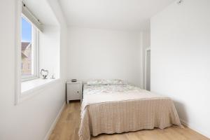 Postel nebo postele na pokoji v ubytování Harmony Apartments - By Honivi Gruppen