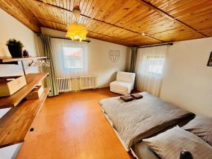 Łóżko lub łóżka w pokoju w obiekcie Chalet Gamma