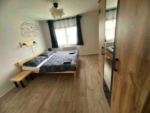 Łóżko lub łóżka w pokoju w obiekcie Chalet Gamma