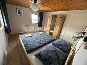 Łóżko lub łóżka w pokoju w obiekcie Chalet Gamma