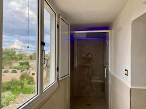 Koupelna v ubytování Belvedere Fondovico - Affitti Brevi Italia + 23 fotografií