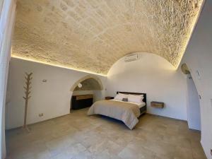 Postel nebo postele na pokoji v ubytování Belvedere Fondovico - Affitti Brevi Italia