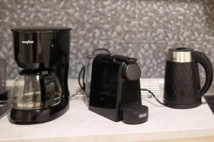 a coffee maker and a blender on a counter at Santa Marina 3 in Ioannina