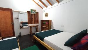 Katil atau katil-katil dalam bilik di Nature Beach Huts