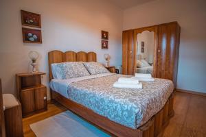 Postel nebo postele na pokoji v ubytování Casa da Vinha