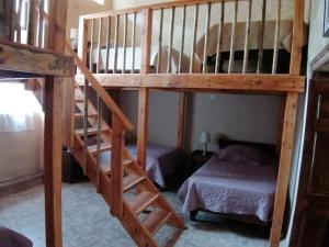 Postel nebo postele na pokoji v ubytování Elquihostel