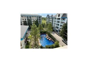an aerial view of a pool at a resort at CozyLuxe Staycation at Pine Suites Tagaytay by Crown Asia in Tagaytay