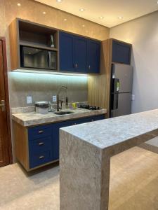 Kuchyň nebo kuchyňský kout v ubytování Flat 213 Ilha Bela Alter do Chão