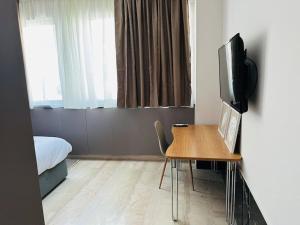TV a/nebo společenská místnost v ubytování Port Brown Suite 2