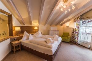 Voodi või voodid majutusasutuse Hotel Plattenhof toas