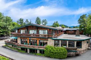 an image of a large house at Best Western Adirondack Inn in Lake Placid